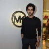 Arjan Bajwa poses for the media at Michael Korrs Store Launch