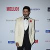 Abhishek Bachchan poses for the media at Hello! Hall of Fame