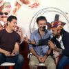 Aamir Khan interacts with the singer at the Song Launch of P.K.