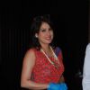 Amrita Raichand poses for the media at Cake Mixing Event
