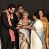 Mamata Banerjee presents an award to Abhishek Bachchan at Kolkatta Film Festival
