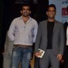 MS Dhoni and Zaheer Khan pose for the media at Positive Health Awards