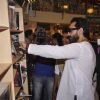 Saif Ali Khan checks out various books at Crossword during the Promotions of Happy Ending