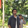 Kunal Kapoor poses for the media at airport while leaving for Arpita Khan's Wedding