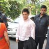 Aamir Khan poses for the media at airport while leaving for Arpita Khan's Wedding