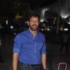 Kabir Khan poses for the media at airport while returning from Arpita Khan's Wedding