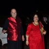 Prem Chopra with wife Uma pose for the media at Arpita Khan's Wedding Reception