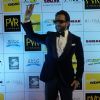 Saif Ali Khan waves to the fans at the Premier of Happy Ending in Delhi