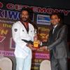Ajay Devgn felicitated with a Trophy by Taekwondo Masters from Korea