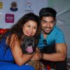 Gurmeet Choudhary and Debina pose with a dog at Pet Adoptathon 2014