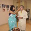 Amol Palekar's daughter feeds him cake at his Art Exhibition