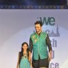 Sunil Grover walks the ramp with a small girl at Wellingkar's 26/11 Tribute