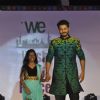 Jay Soni walks the ramp with a small girl at Wellingkar's 26/11 Tribute