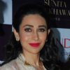 Karisma Kapoor poses for the media at Notandas Jewelers New Collection Launch