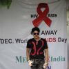 Harish Kumar poses for the media at Medscape India AIDS Awareness Event