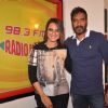 Ajay Devgn and Sonakshi Sinha pose for the media at the Promotions of Action Jackson at Radio Mirchi