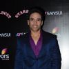 Tusshar Kapoor poses for the media at Sansui Stardust Awards Red Carpet