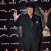 Prem Chopra poses for the media at Sansui Stardust Awards Red Carpet