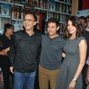 Vidhu Vinod Chopra, Aamir Khan and Anushka Sharma pose for the media at the Special Screening of P.K