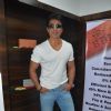 Sonu Sood poses for the media at the Launch of Building Bricks