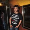 Girish Kumar poses for the media at the Special Screening of P.K.
