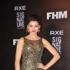 Urvashi Rautela poses for the media at FHM Bachelor of the Year Bash