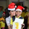 Shriya Saran poses for the media at the Christmas Celebration with Access Life NGO Kids