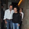 Aamir Khan and Sanjay Dutt pose for the media at the Special Screening of P.K.