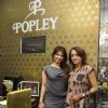 Tanishaa Mukerji poses with a member of Popley Group