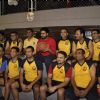Abhishek Bachchan poses with members of Jamnabai Narsee School