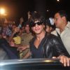 Shah Rukh Khan smiles for the camera at Airport