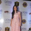 Amy Billimoria poses for the media at Lion Gold Awards