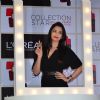 Aishwarya Rai Bachchan poses with the L'Oreal Paris Moist Matte Collection Pure Reds