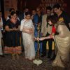 Varsha Usgaonkar lights the lamp at Golden Achiever Awards
