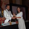 Rashmi Desai receives an award at Golden Achiever Awards
