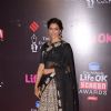 Deepika Padukone poses for the media at 21st Annual Life OK Screen Awards Red Carpet