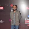 Ketan Mehta poses for the media at 21st Annual Life OK Screen Awards Red Carpet
