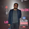 Anurag Kashyap poses for the media at 21st Annual Life OK Screen Awards Red Carpet