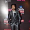 Nikhil Dwivedi poses for the media at 21st Annual Life OK Screen Awards Red Carpet