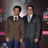 Girish Kumar and Ramesh Taurani pose for the media at 21st Annual Life OK Screen Awards Red Carpet