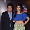 Bhushan Kumar poses with wife Divya Khosla at 21st Annual Life OK Screen Awards Red Carpet