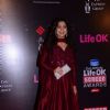 Juhi Chawla poses for the media at 21st Annual Life OK Screen Awards Red Carpet