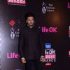 Riteish Deshmukh poses for the media at 21st Annual Life OK Screen Awards Red Carpet