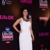 Tanishaa Mukerji poses for the media at 21st Annual Life OK Screen Awards Red Carpet
