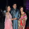 Shatrughan Sinha poses with wife Poonam Sinha and daughter Sonakshi Sinha at the Wedding Reception