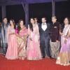 Family members pose for the media at the Wedding Reception of Kush Sinha