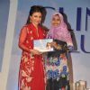 Soha Ali Khan felicitates an achiever at the Clinic Plus Scholarship Event