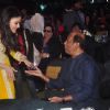 Aishwarya Rai Bachchan was snapped greeting Rajinikanth at the Music Launch of Shamitabh
