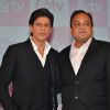 Shah Rukh Khan and Punit Goenka pose for the media at the Launch of '& TV'