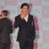 Shah Rukh Khan gives a flying kiss to the fans at the Launch of '& TV'